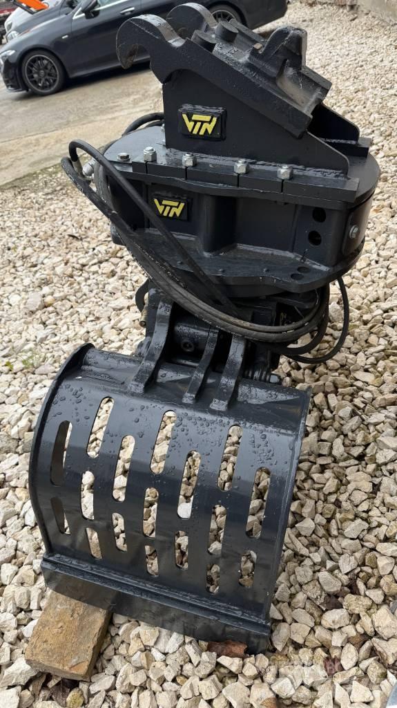 Develon DX 57 W-7 Pelle sur pneus