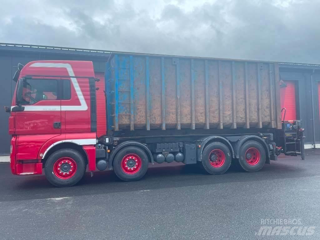 MAN TGX 35.480 Camion plateau ridelle avec grue