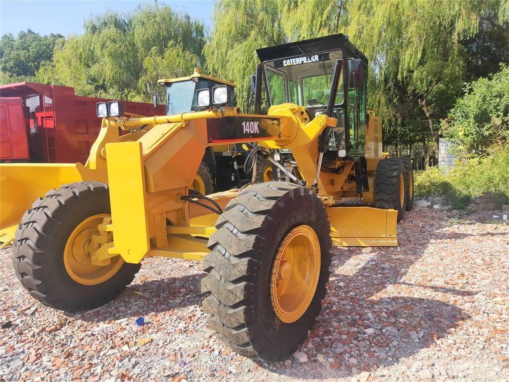 CAT 140 K Niveleuse
