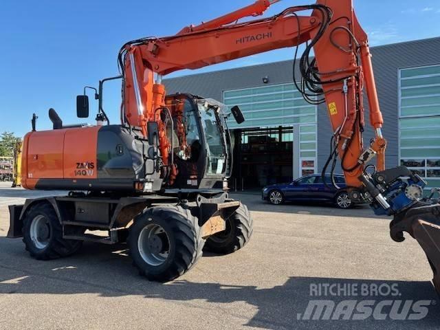 Hitachi ZX 140 W-5 Pelle sur pneus
