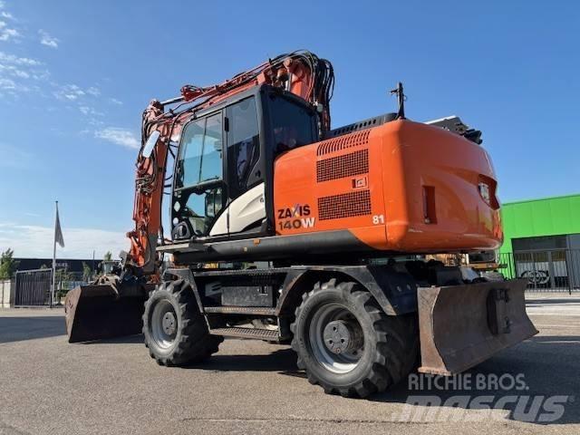 Hitachi ZX 140 W-5 Pelle sur pneus