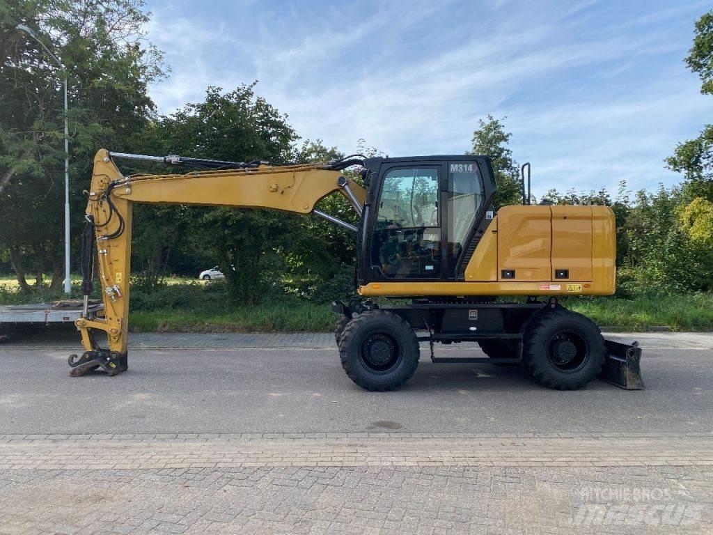 CAT 314 Next gen Pelle sur pneus