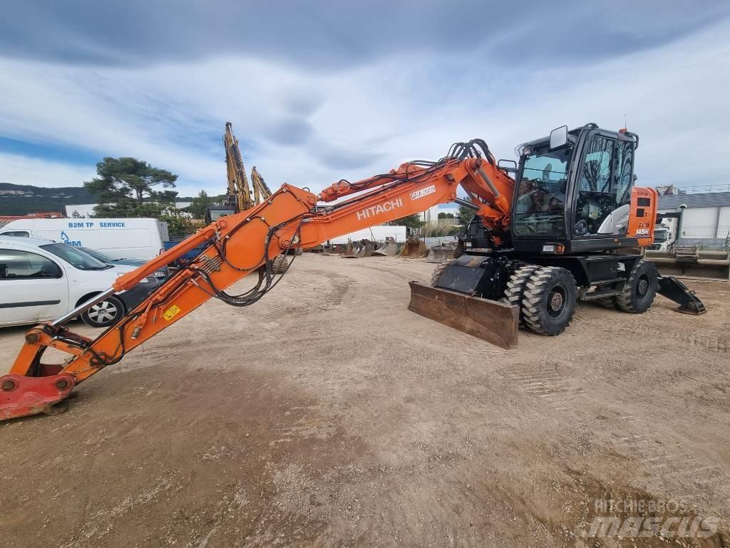 Hitachi ZX145W Pelle sur pneus