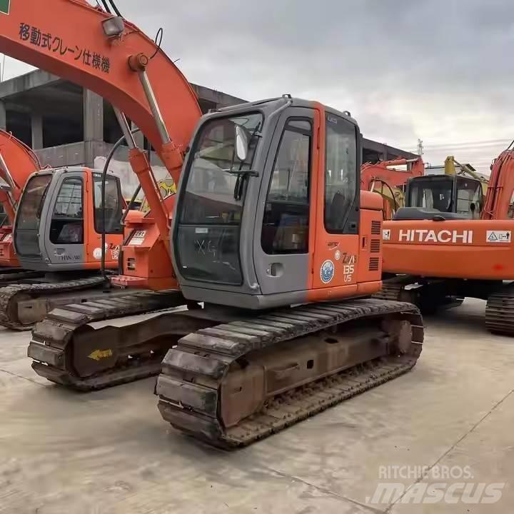 Hitachi ZX135US Pelle sur chenilles
