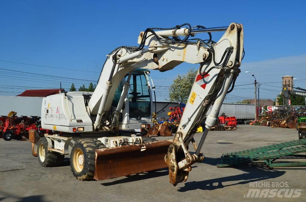 CASE WX 145 Pelle sur pneus