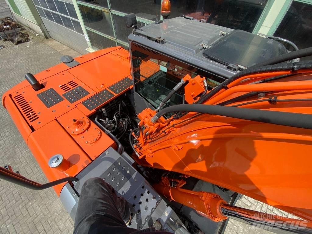 Hitachi ZX 140 W-3 Pelle sur pneus