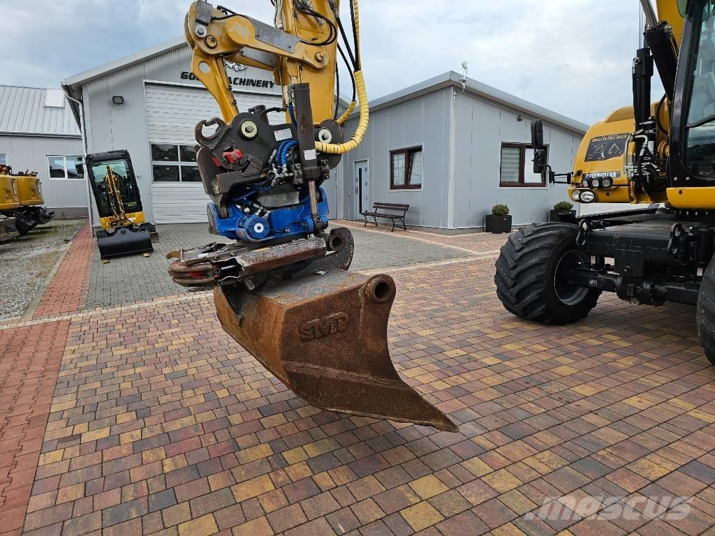 CAT M 313 D Pelle sur pneus
