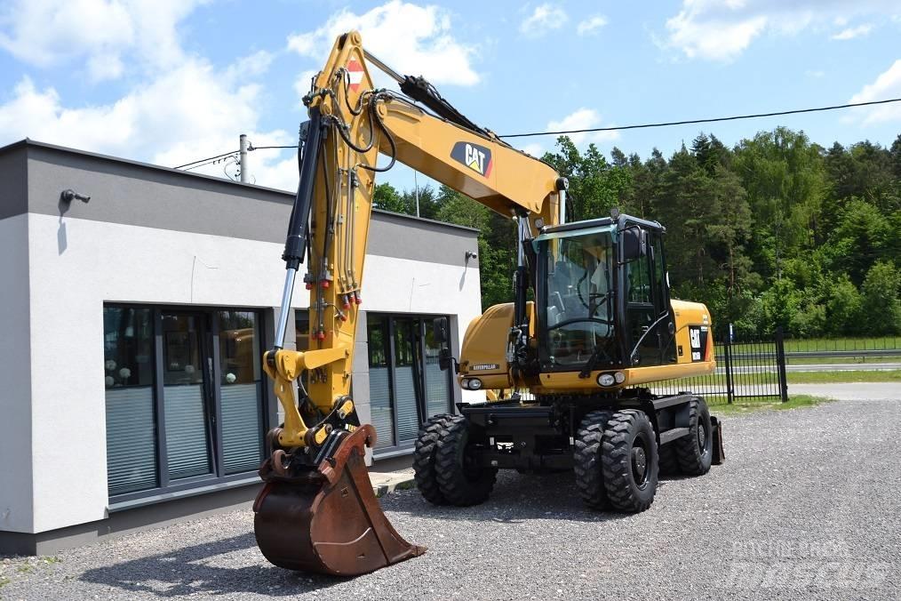 CAT M 316 D Pelle sur pneus