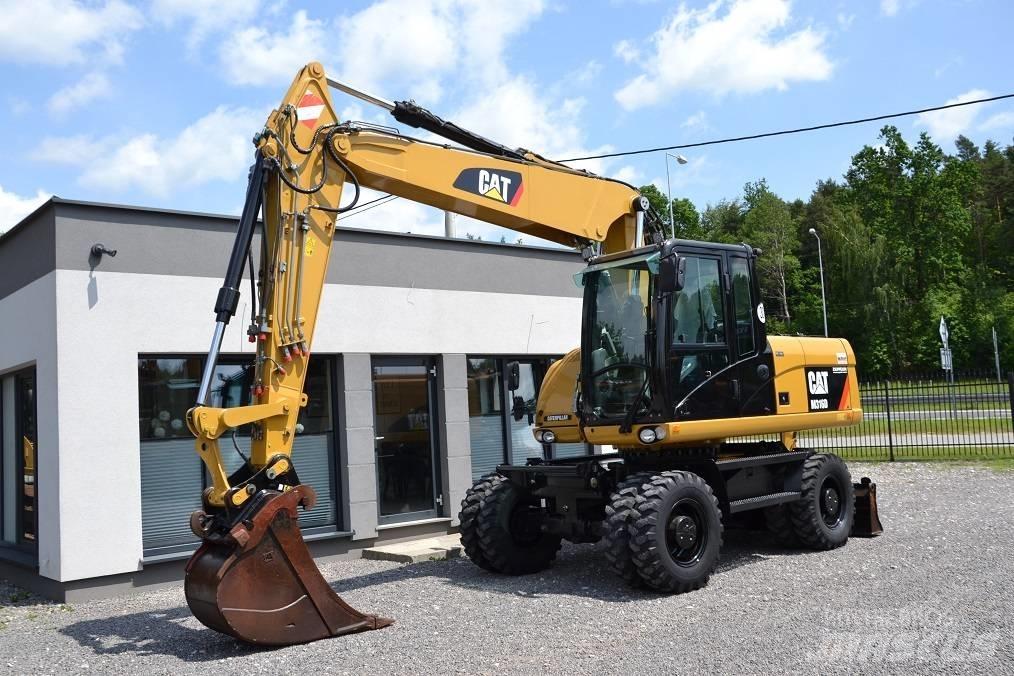CAT M 316 D Pelle sur pneus