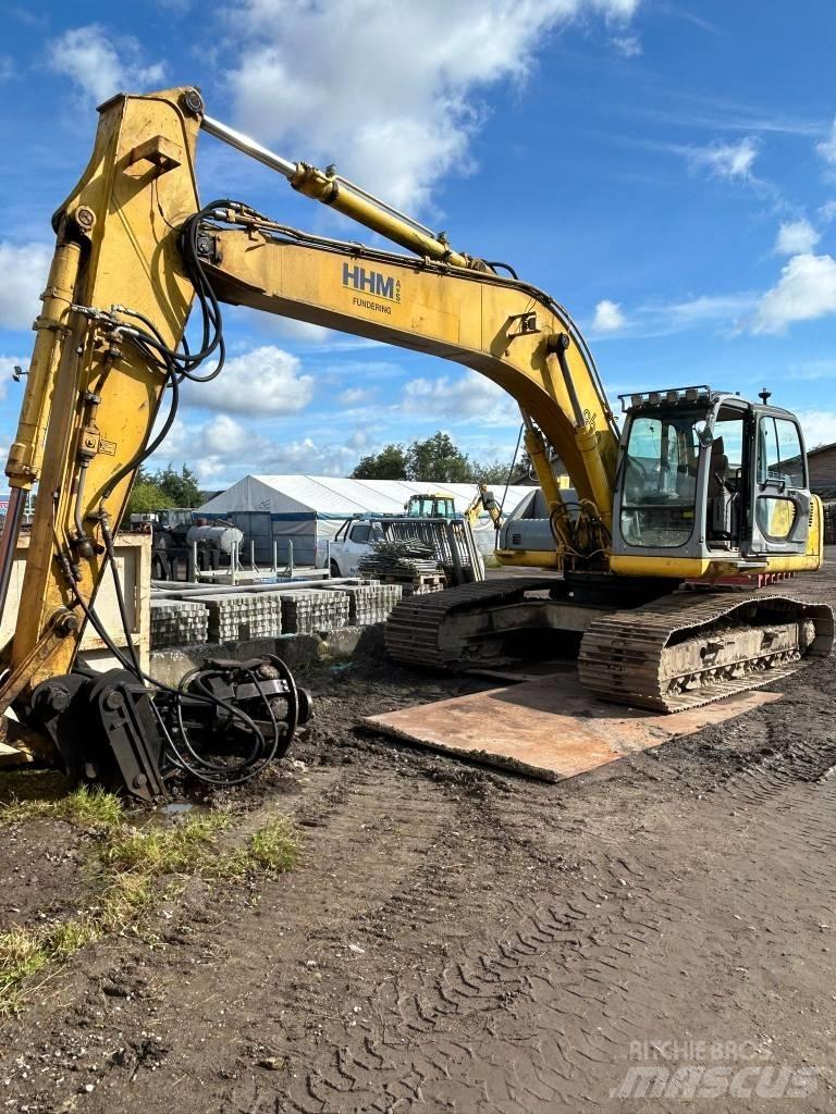 New Holland E 265 Pelle sur chenilles