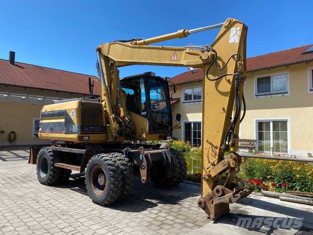 CAT M 312 Pelle sur pneus