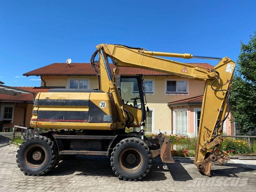 CAT M 312 Pelle sur pneus