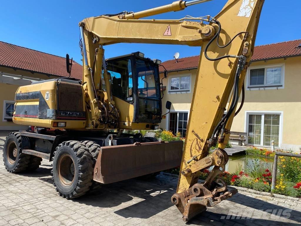 CAT M 312 Pelle sur pneus