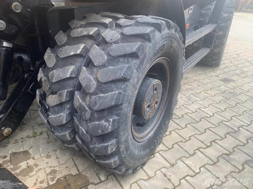 CAT M 318 F Pelle sur pneus