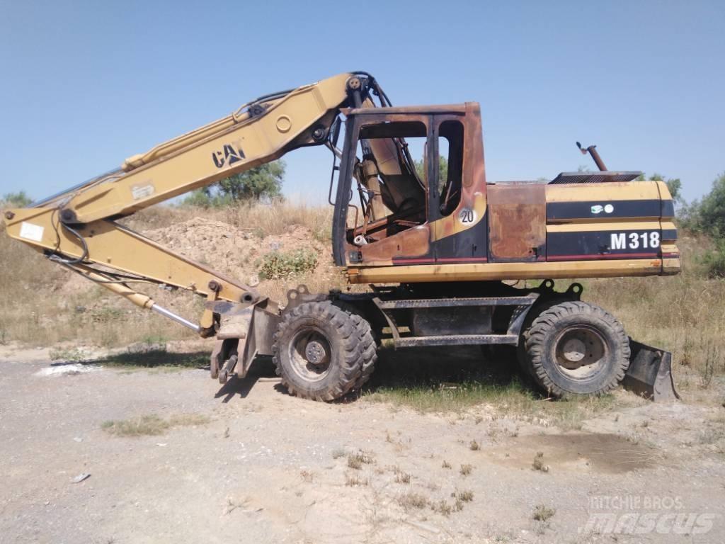 CAT M318 parts M 318 Pelle sur pneus