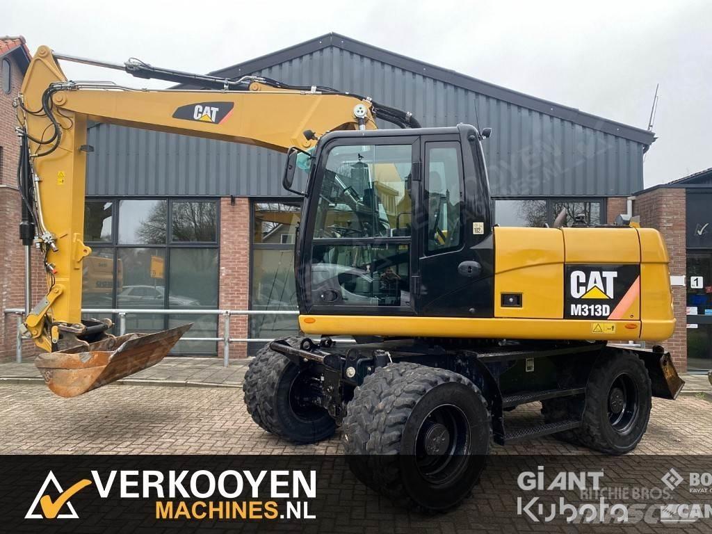CAT M313D Pelle sur pneus