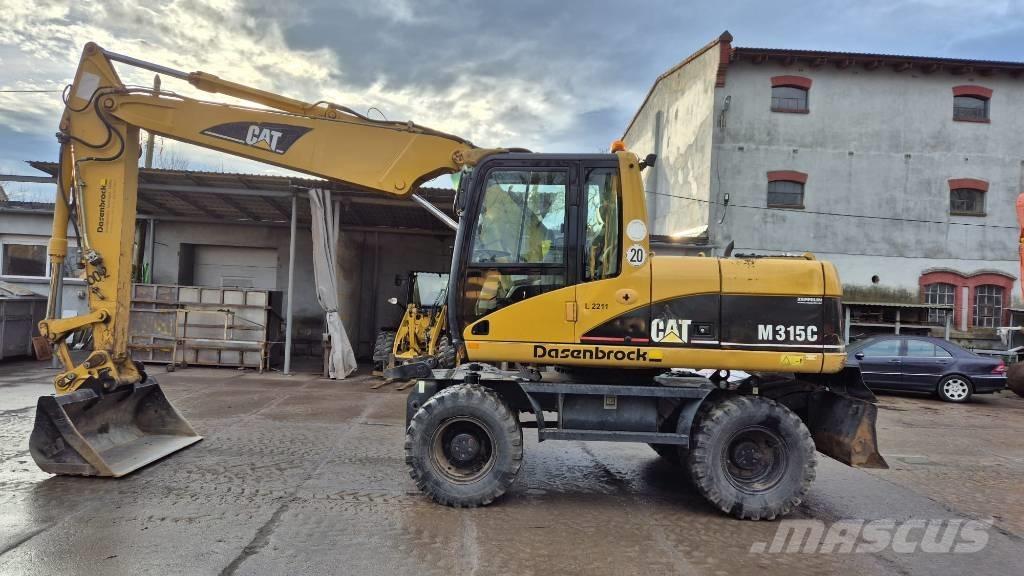 CAT M 315 C Pelle sur pneus
