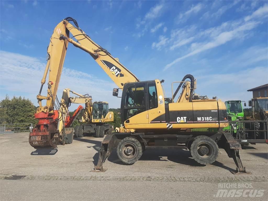 CAT M318C MH Pelle sur pneus