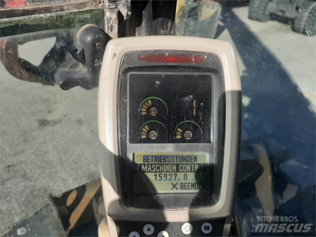 CAT M318C MH Pelle sur pneus