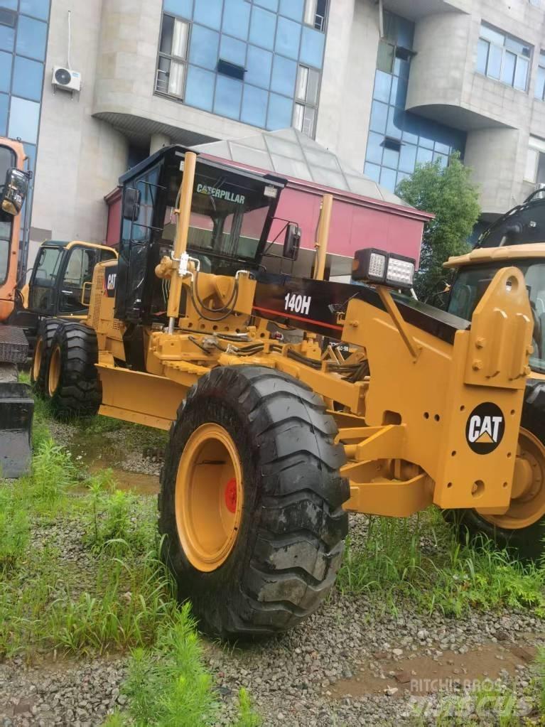 CAT 140 H Tractopelle