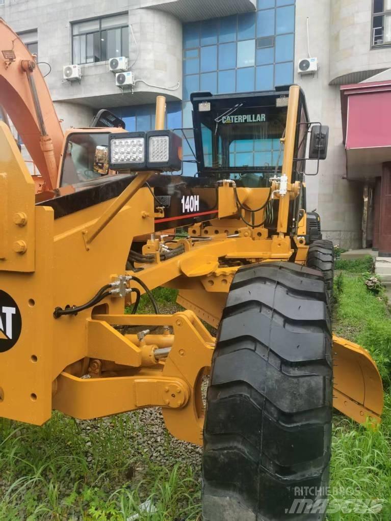 CAT 140 H Tractopelle