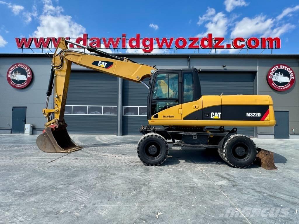 CAT M 322 D Pelle sur pneus