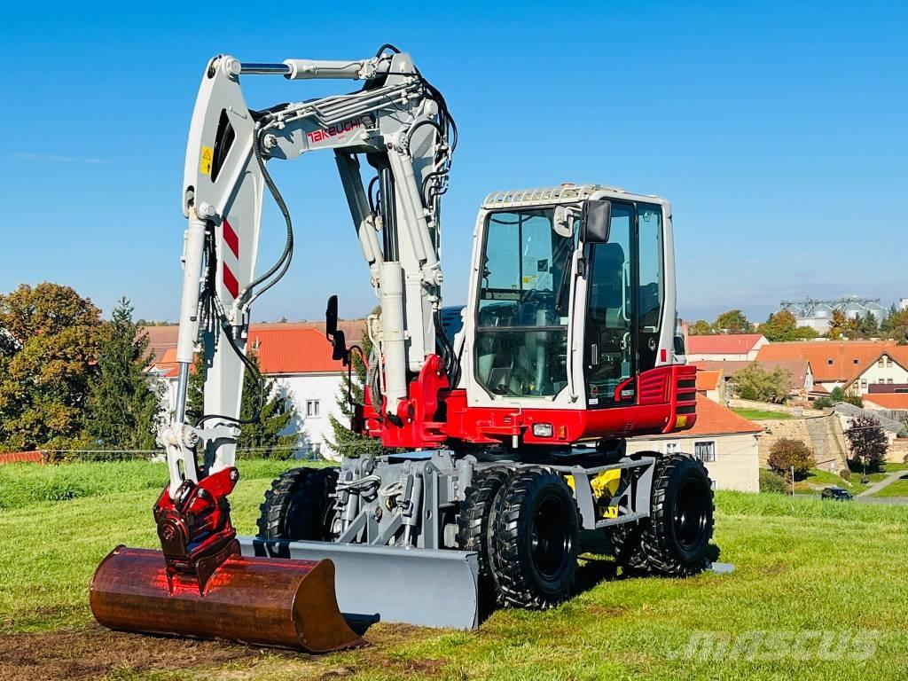 Takeuchi TB 295 W Pelle sur pneus