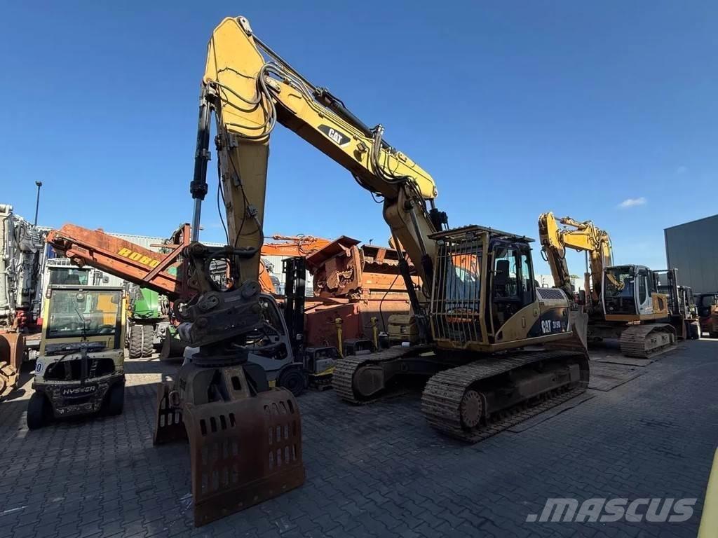 CAT 319D Pelle sur chenilles