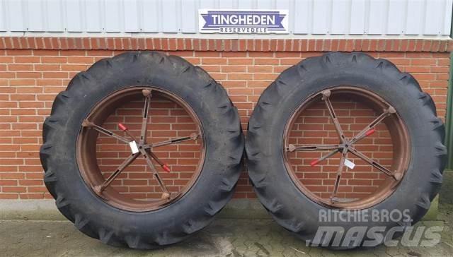  38 16.9-38 Pneus, roues et jantes