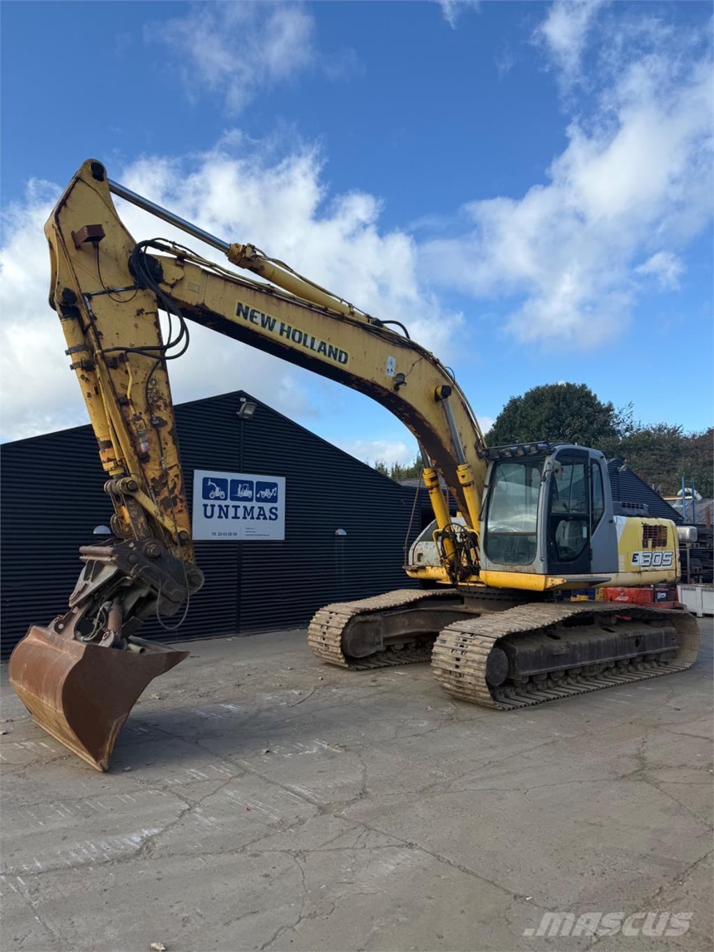 New Holland E305 Pelle sur chenilles