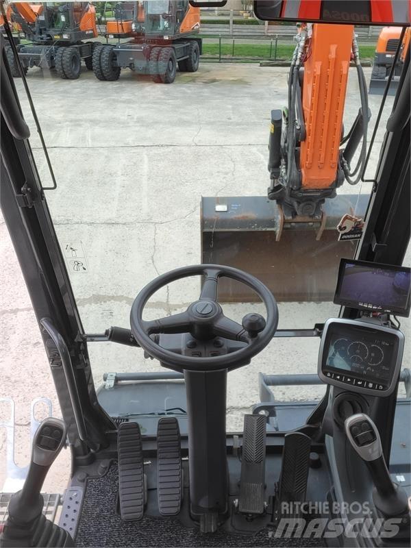 Doosan DX140W-5 Pelle sur pneus