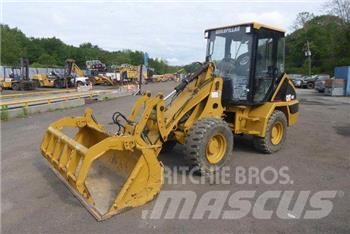 CAT 902 Chargeuse sur pneus