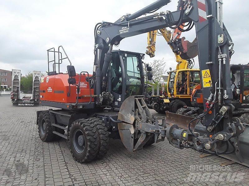 Atlas 140W Pelle sur pneus