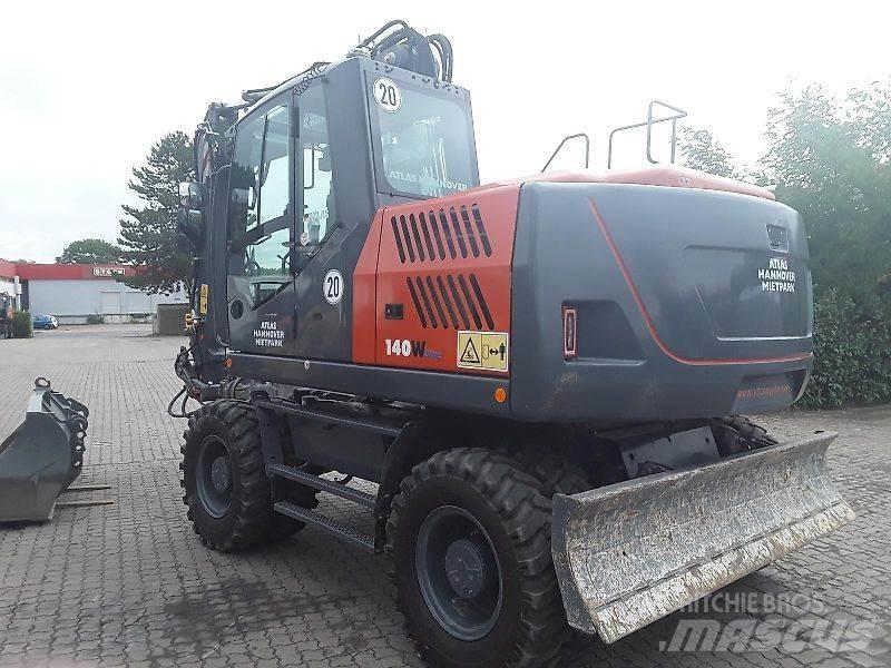 Atlas 140W Pelle sur pneus