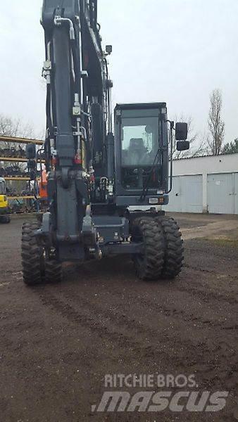 Atlas 150W Pelle sur pneus