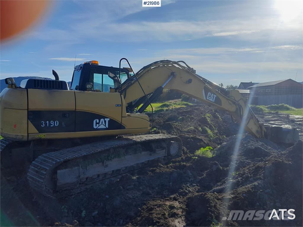 CAT 319DL Pelle sur chenilles