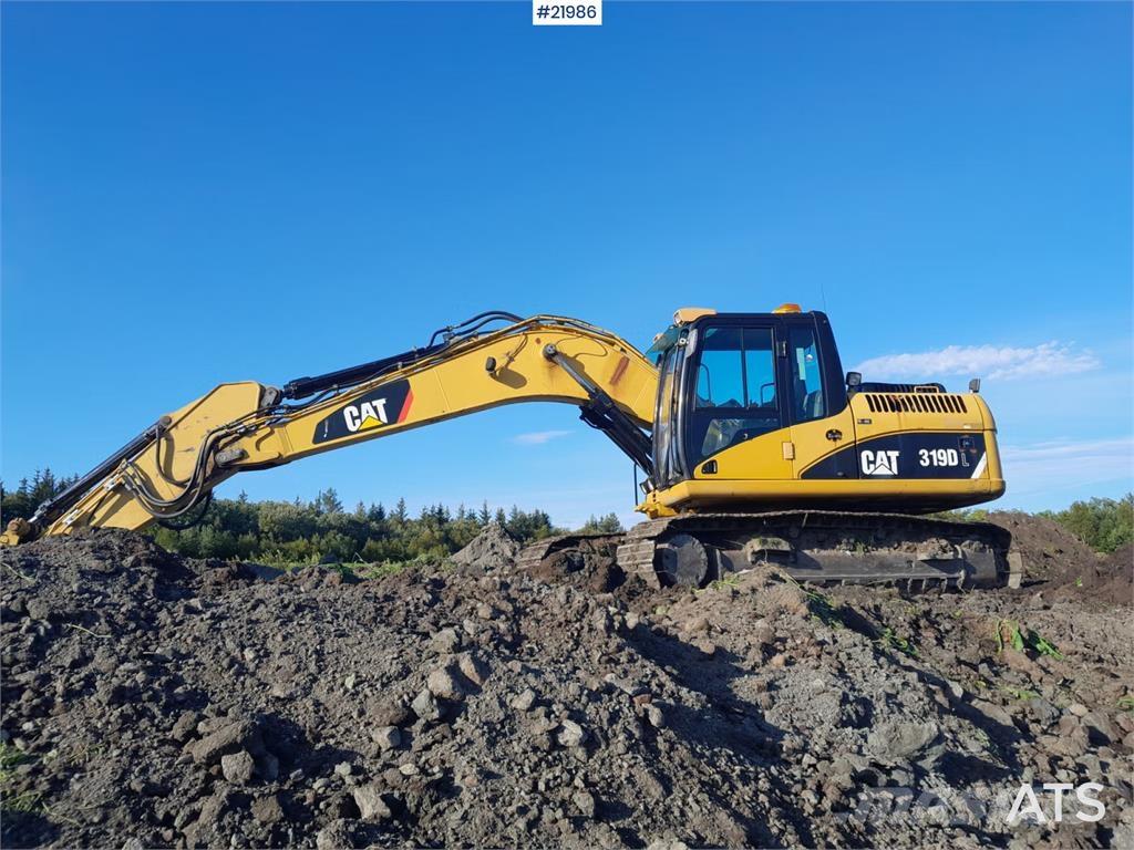 CAT 319DL Pelle sur chenilles