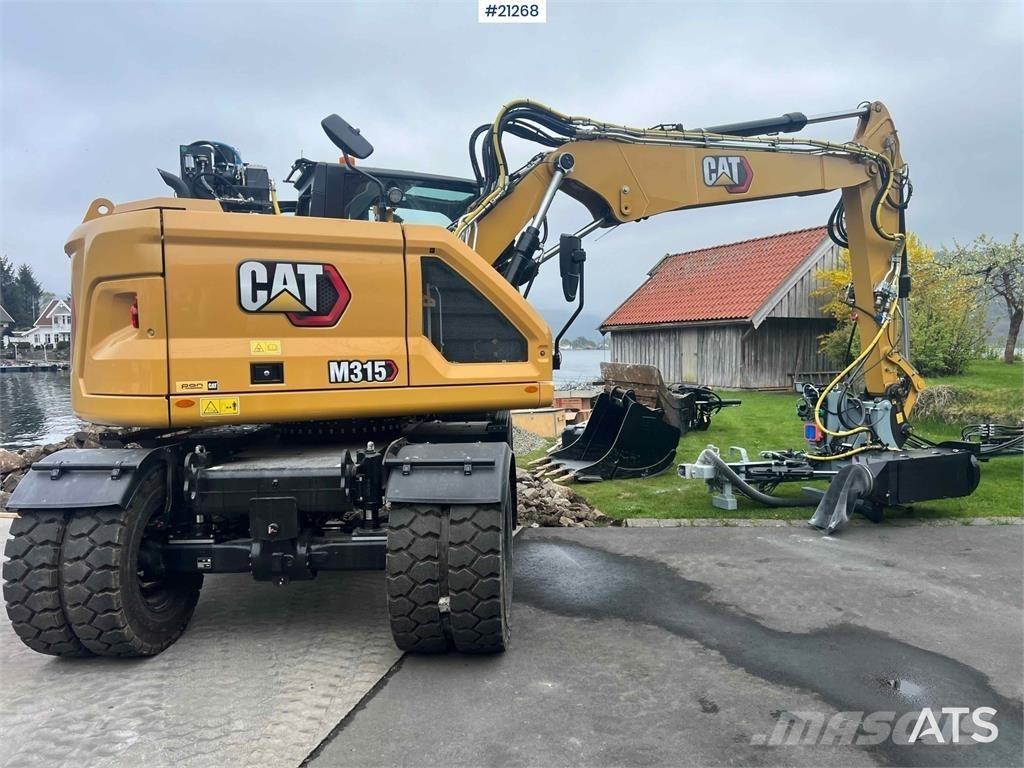 CAT M315 Pelle sur pneus