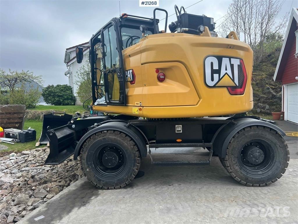 CAT M315 Pelle sur pneus