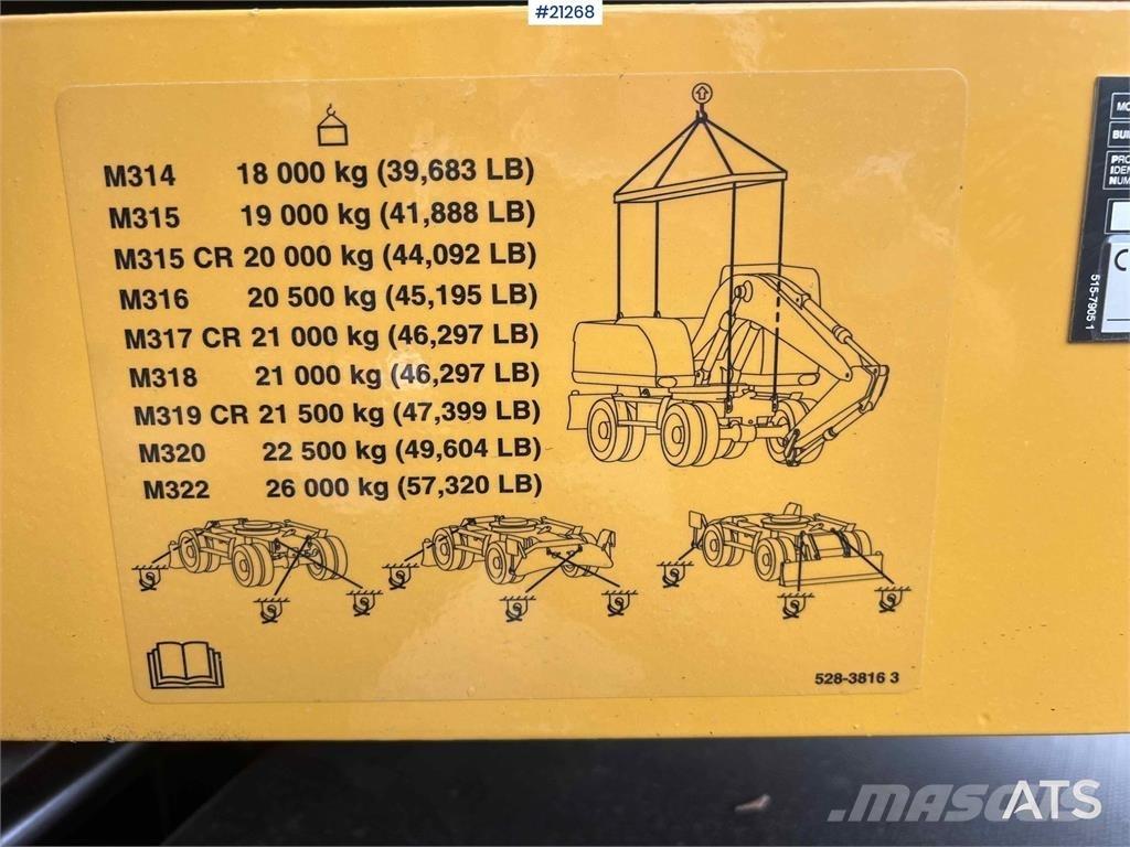 CAT M315 Pelle sur pneus