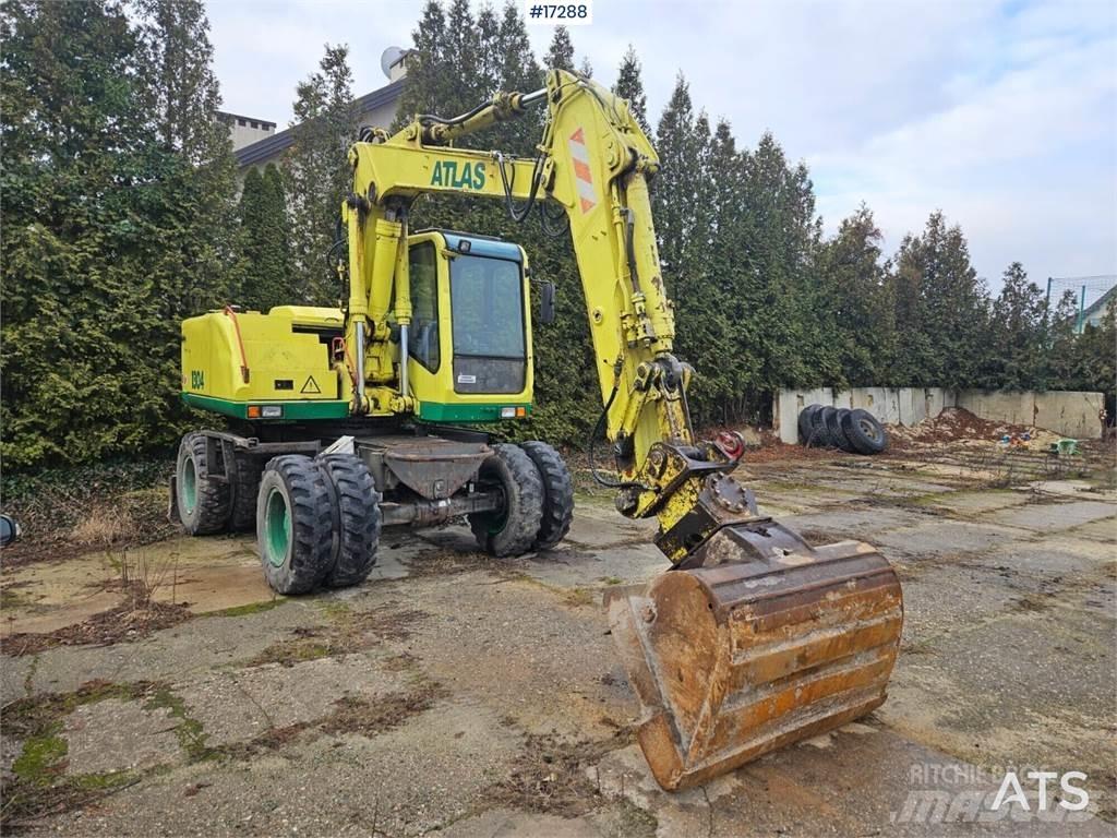 Atlas 1304 Pelle sur pneus