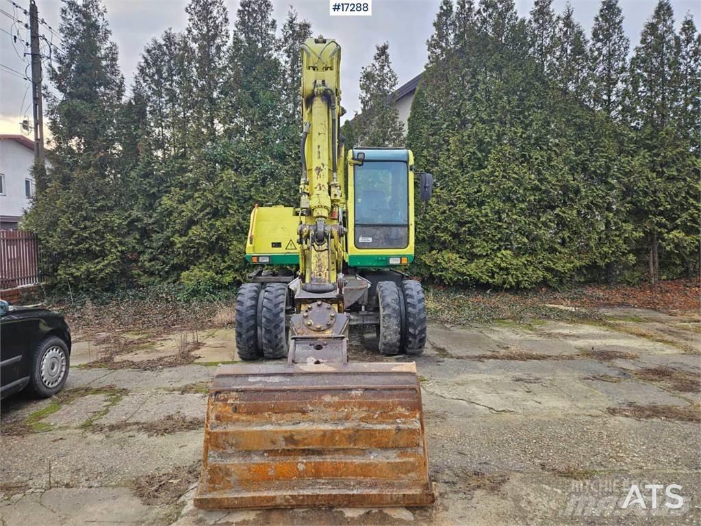Atlas 1304 Pelle sur pneus