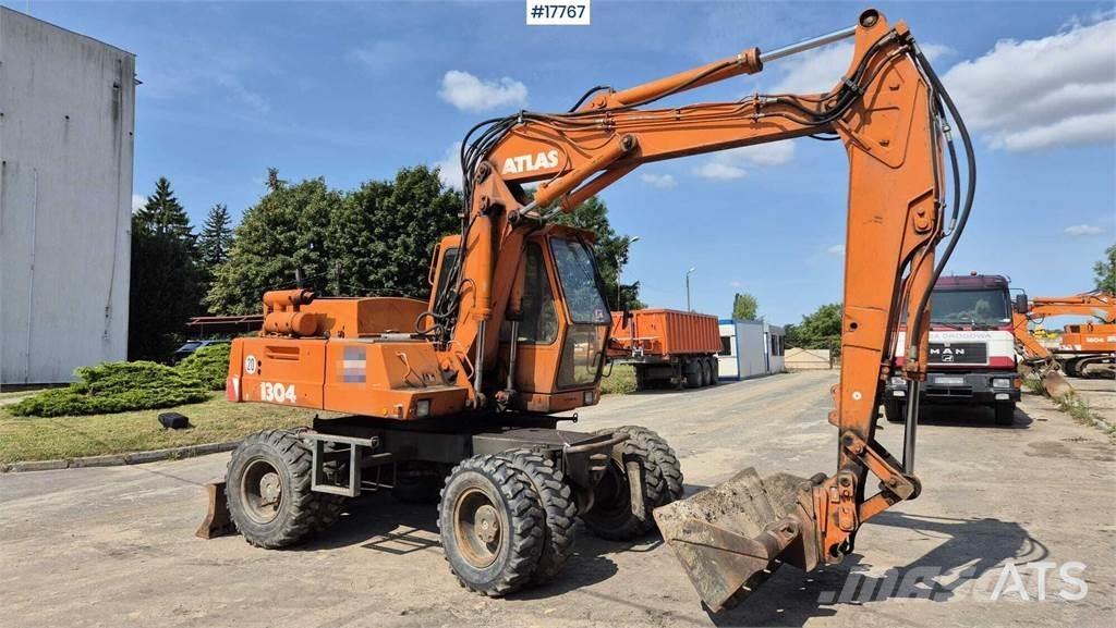 Atlas 1304 Pelle sur pneus