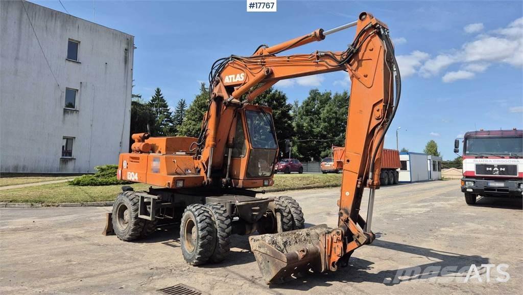 Atlas 1304 Pelle sur pneus