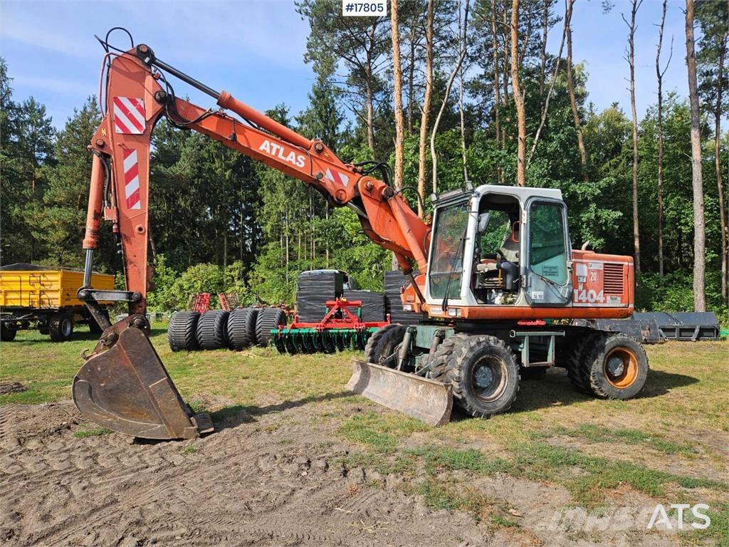 Atlas 1404 Pelle sur pneus
