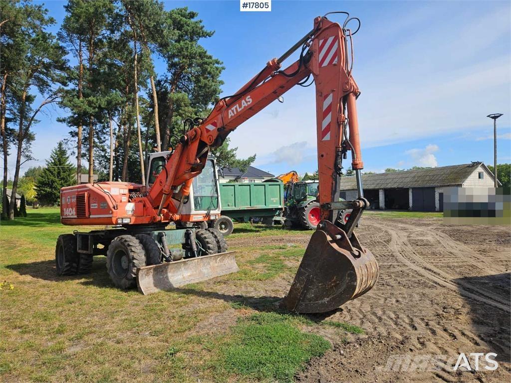 Atlas 1404 Pelle sur pneus