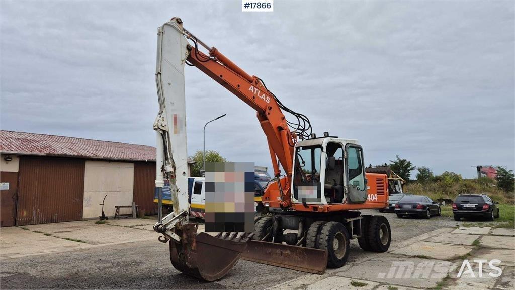 Atlas 1404 Pelle sur pneus