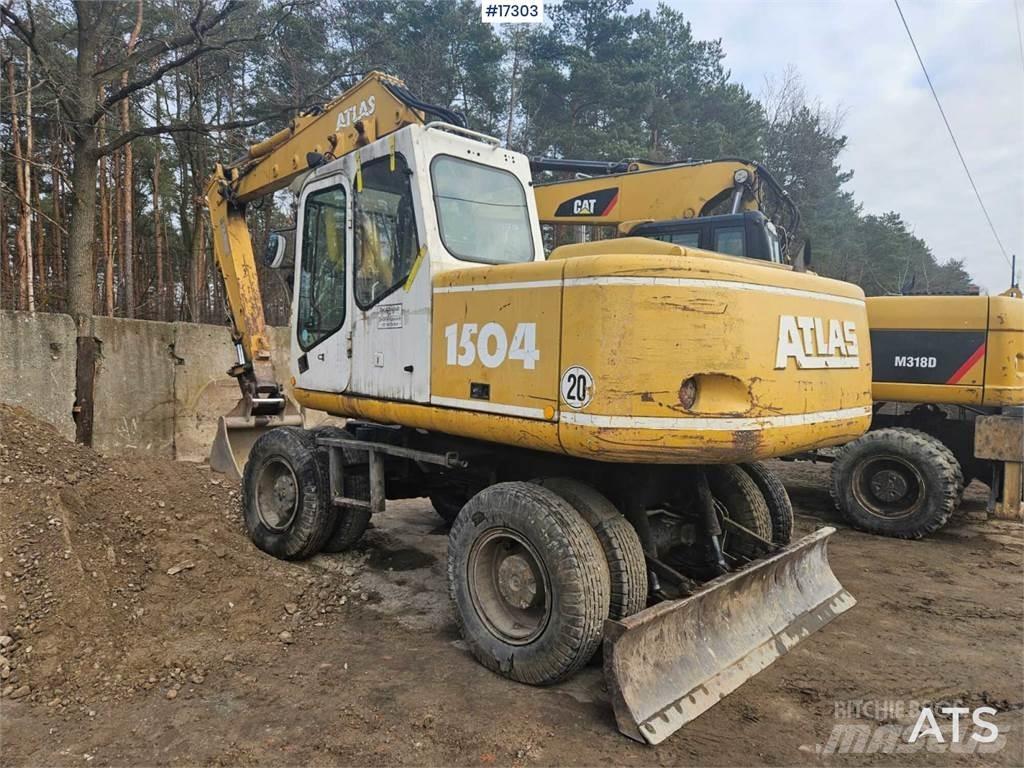Atlas 1504 Pelle sur pneus