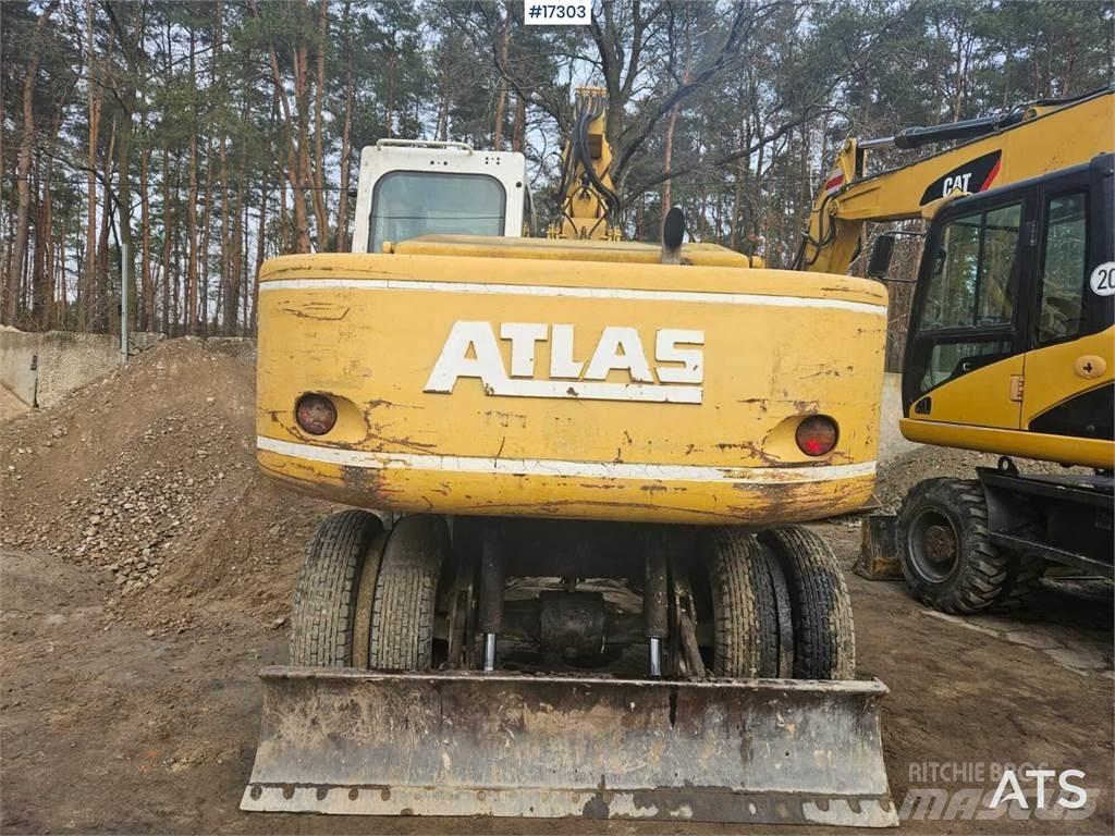 Atlas 1504 Pelle sur pneus