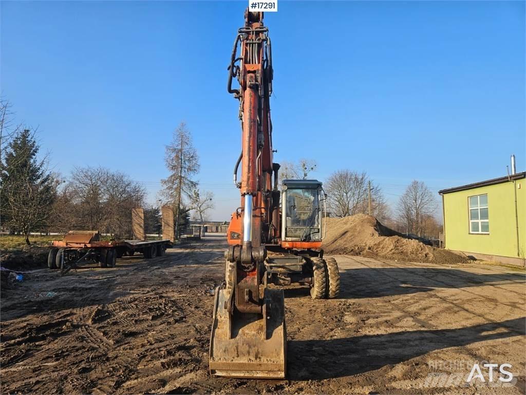 Atlas 2205 Pelle sur pneus